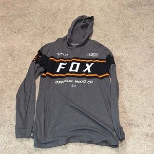 Fox long sleeve shirt with hood. Only worn few times still in brand new shape.